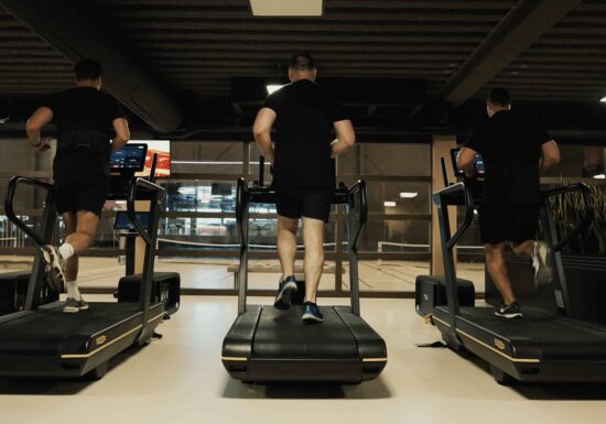 Executive protection training | Infinite Risks | three men running on treadmills in a modern gym